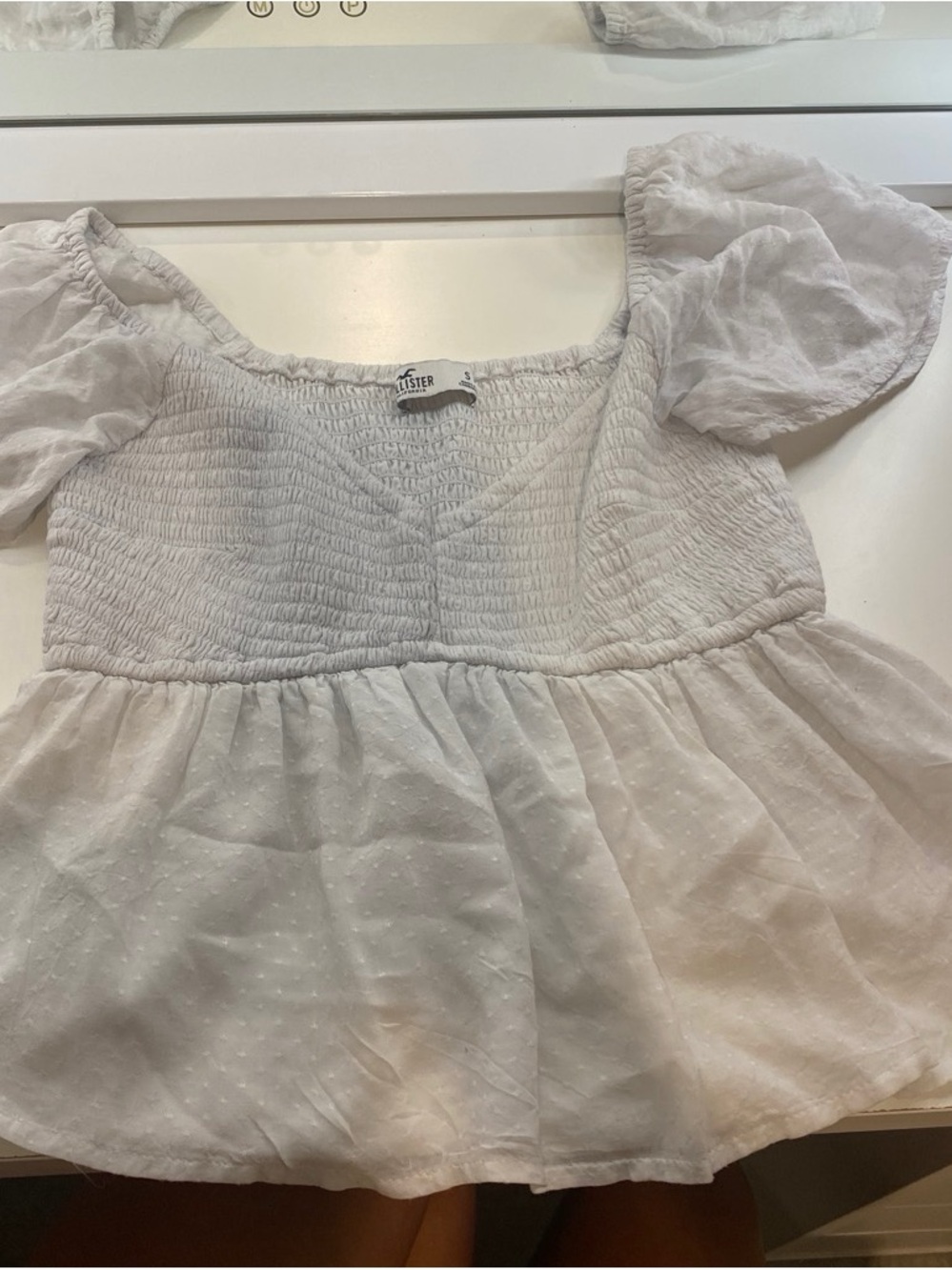 Hollister White Smocked Baby Doll Top Sz Small Swiss Dot Peplum Flutter Sleeve